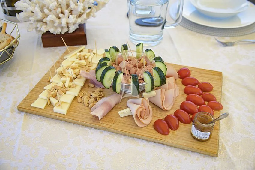 a board game on a table aboard ANNE MARIE Yacht for Sale