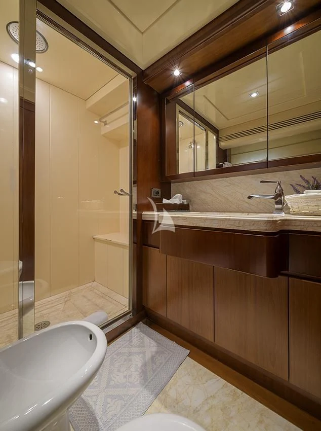 a bathroom with a sink and a mirror aboard ANNE MARIE Yacht for Sale