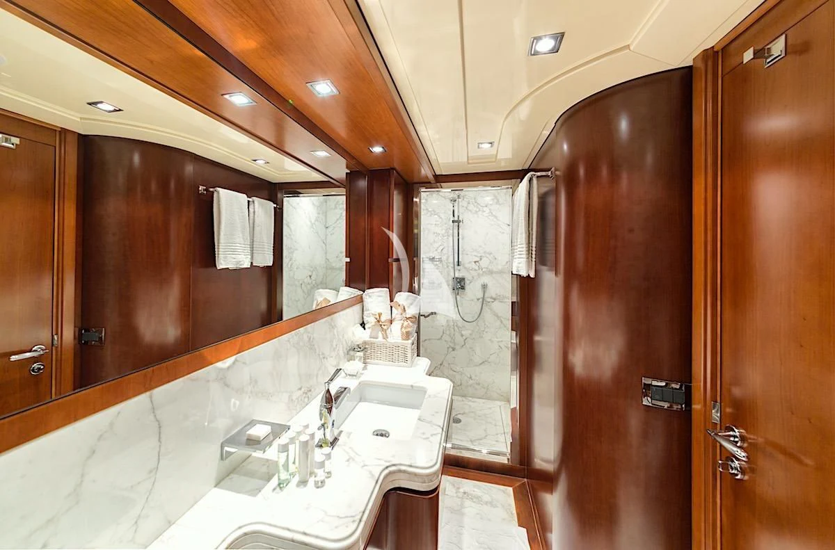 a bathroom with a countertop sink and cabinets aboard ANNE MARIE Yacht for Sale