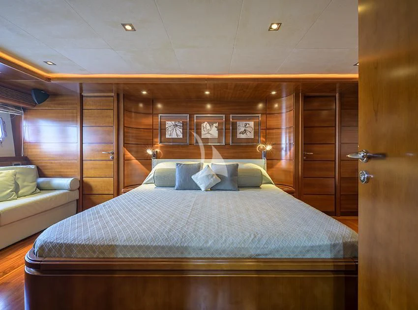 a bed in a room aboard ANNE MARIE Yacht for Sale