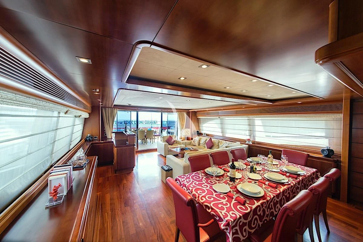 a dining room with a table and chairs aboard ANNE MARIE Yacht for Sale