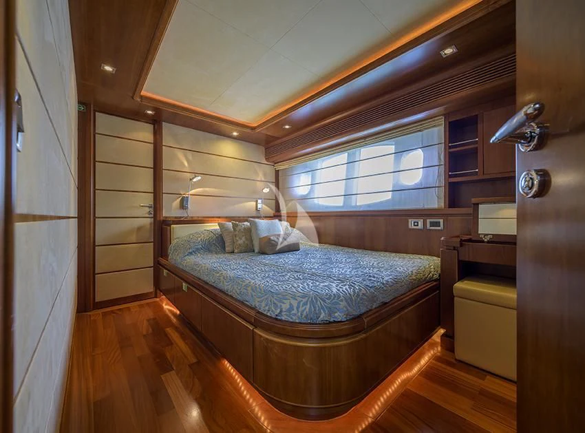 a bed in a room aboard ANNE MARIE Yacht for Sale