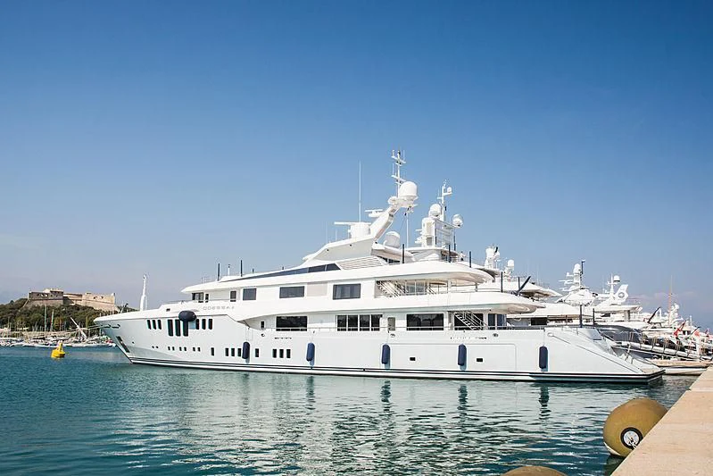 a large white boat in the water aboard ODESSA II Yacht for Sale