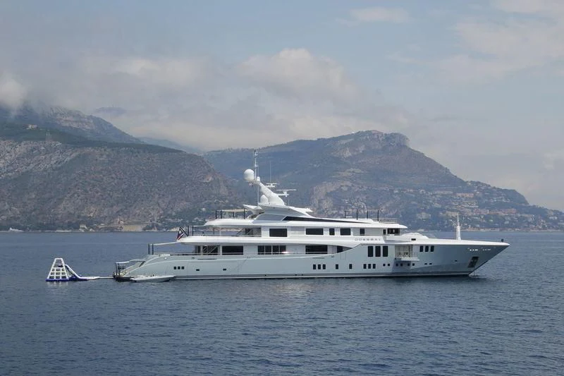 a white yacht in the water aboard ODESSA II Yacht for Sale