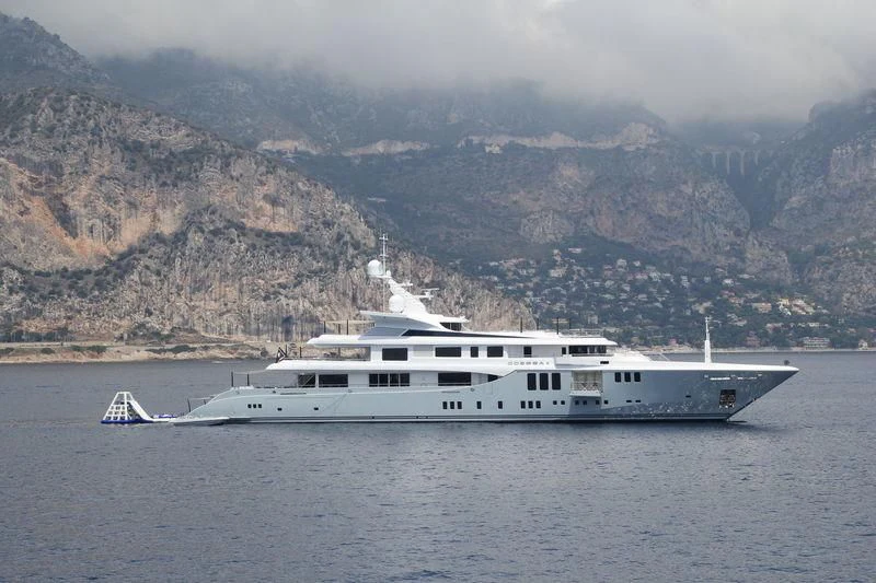 a white yacht in the water aboard ODESSA II Yacht for Sale