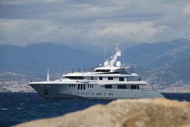 a large white ship on the water aboard ODESSA II Yacht for Sale