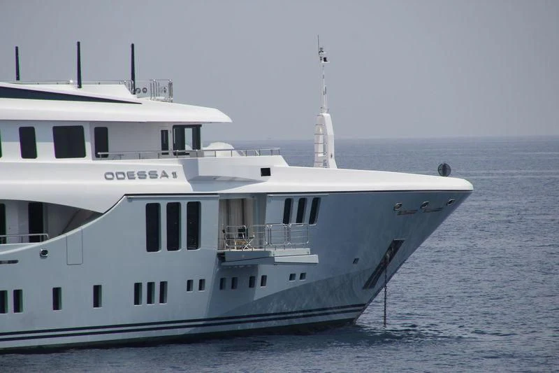 a large white boat in the water aboard ODESSA II Yacht for Sale