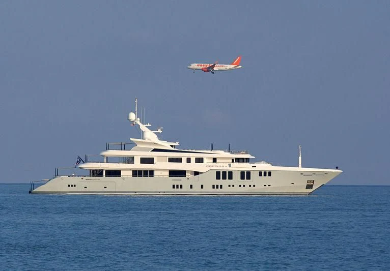a helicopter flying over a boat aboard ODESSA II Yacht for Sale