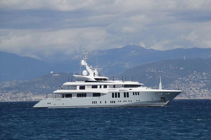 a white yacht in the water aboard ODESSA II Yacht for Sale