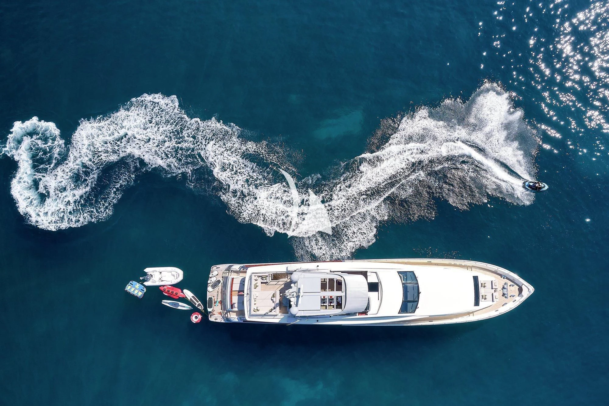 a couple of boats in the water aboard APMONIA Yacht for Sale