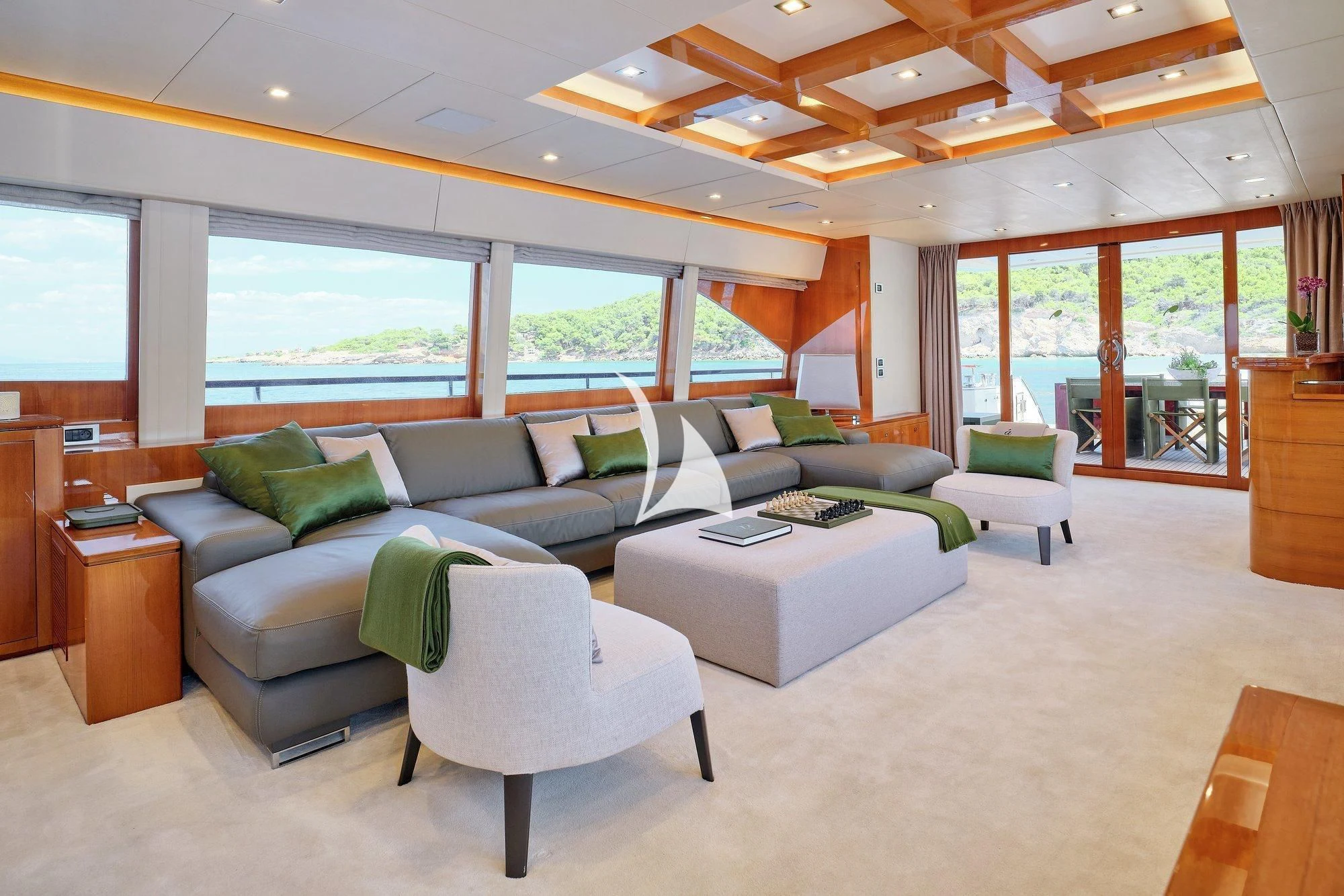a living room with a large window aboard APMONIA Yacht for Sale