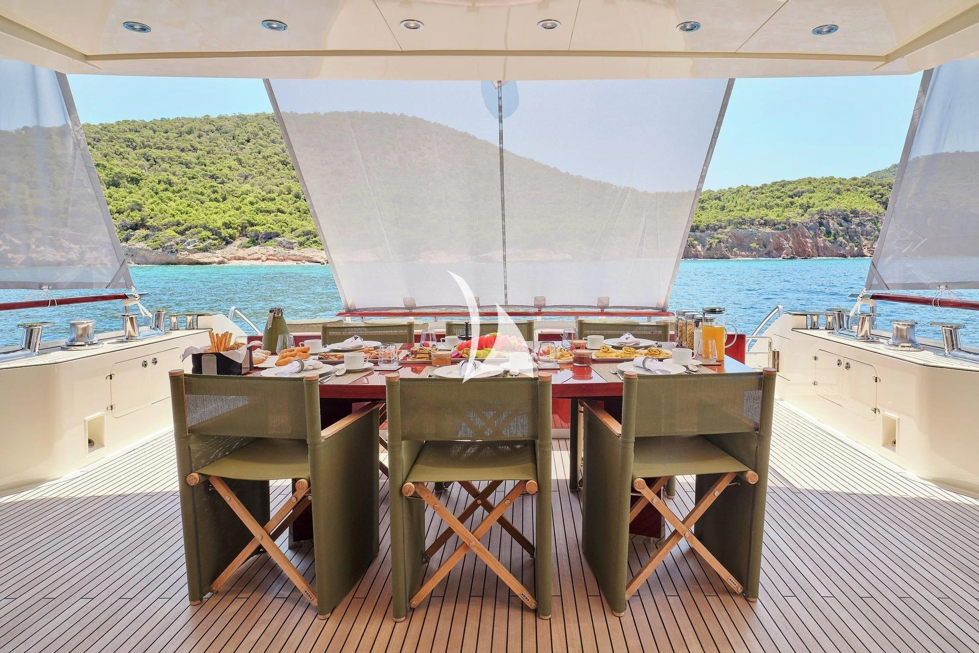 a table on a boat aboard APMONIA Yacht for Sale
