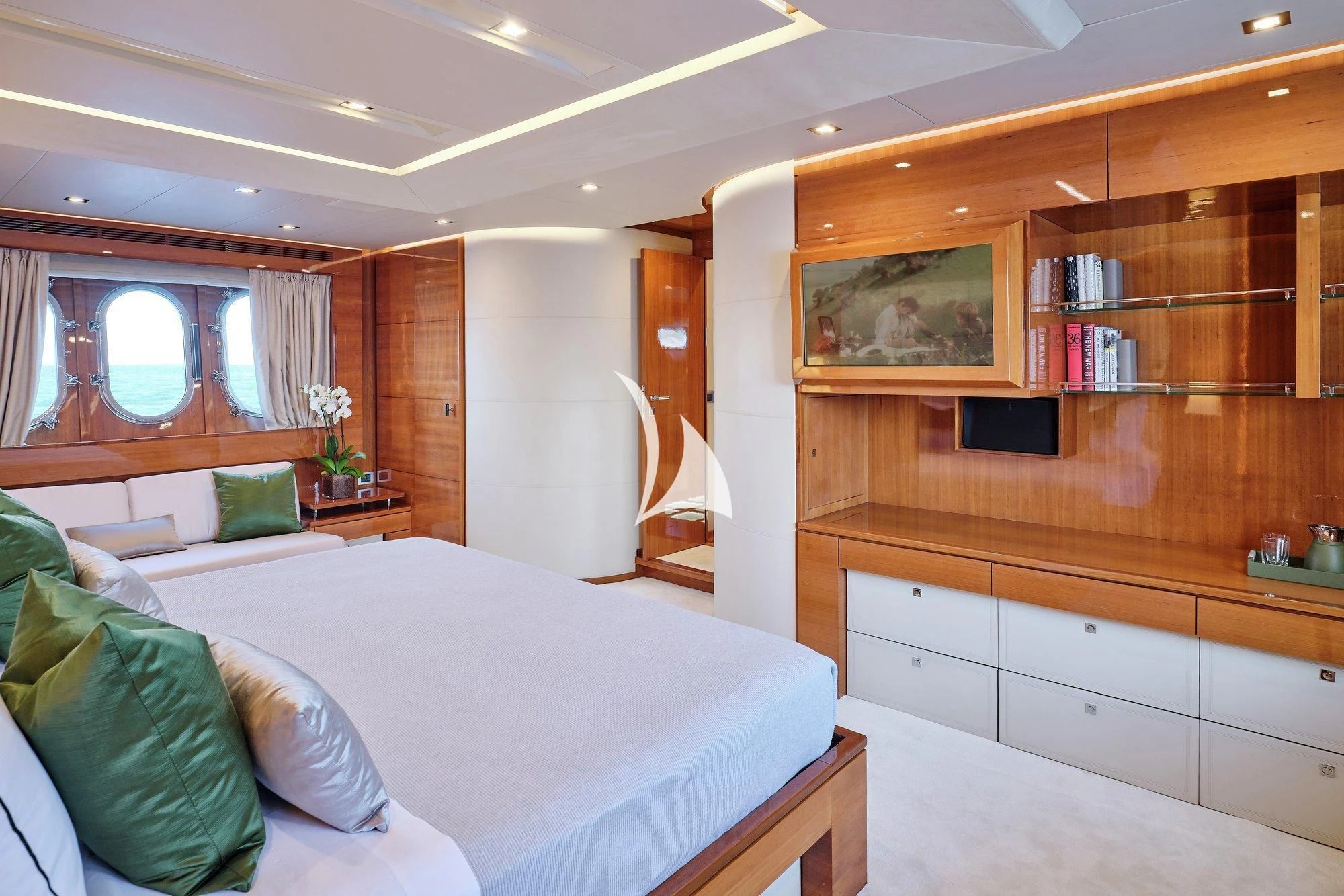 a room with a bed and a window aboard APMONIA Yacht for Sale