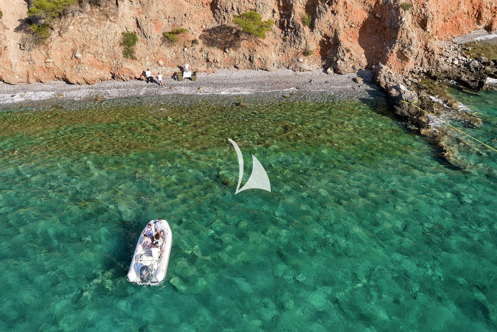 a boat in the water aboard APMONIA Yacht for Sale
