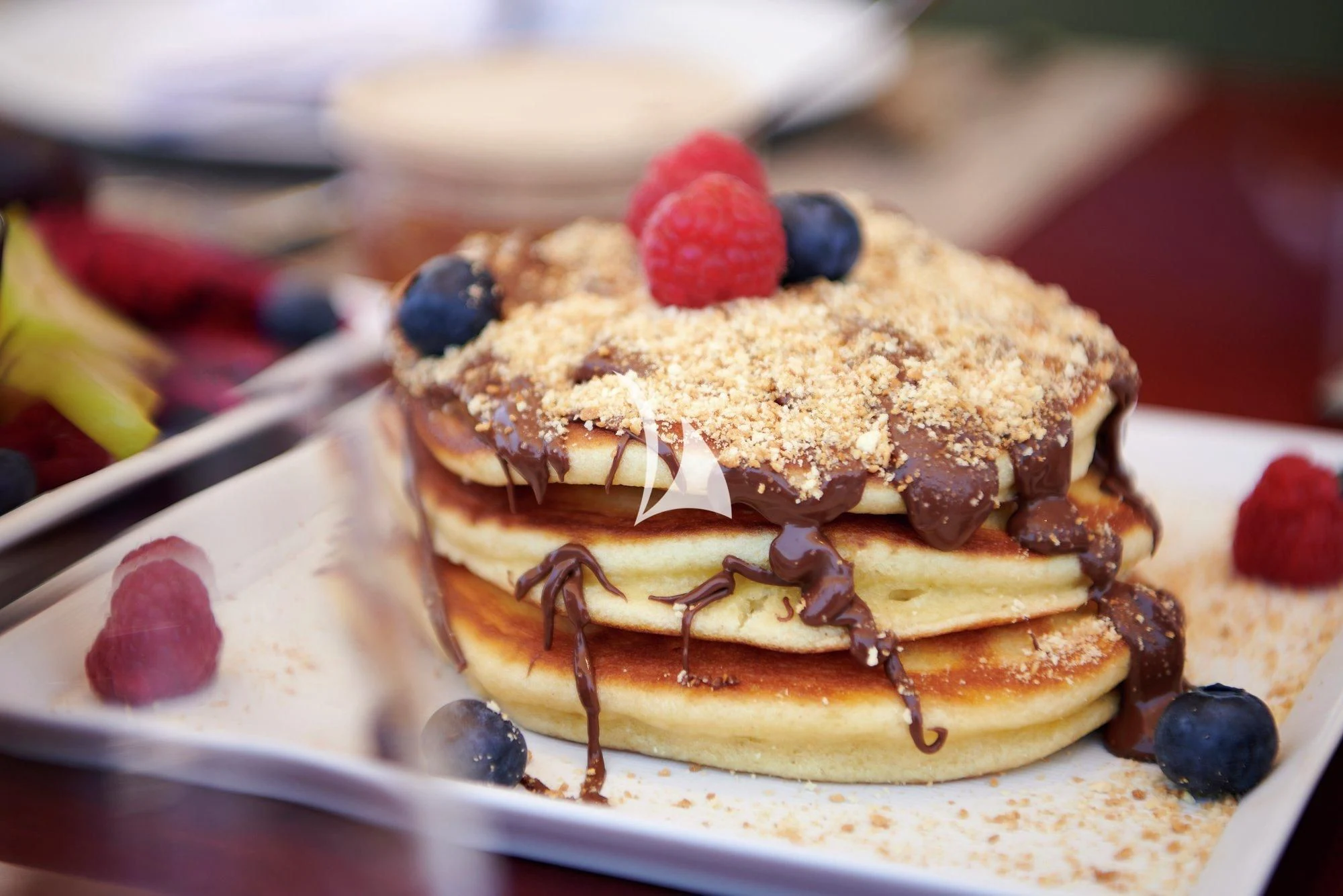 a cake with a slice cut out aboard APMONIA Yacht for Sale