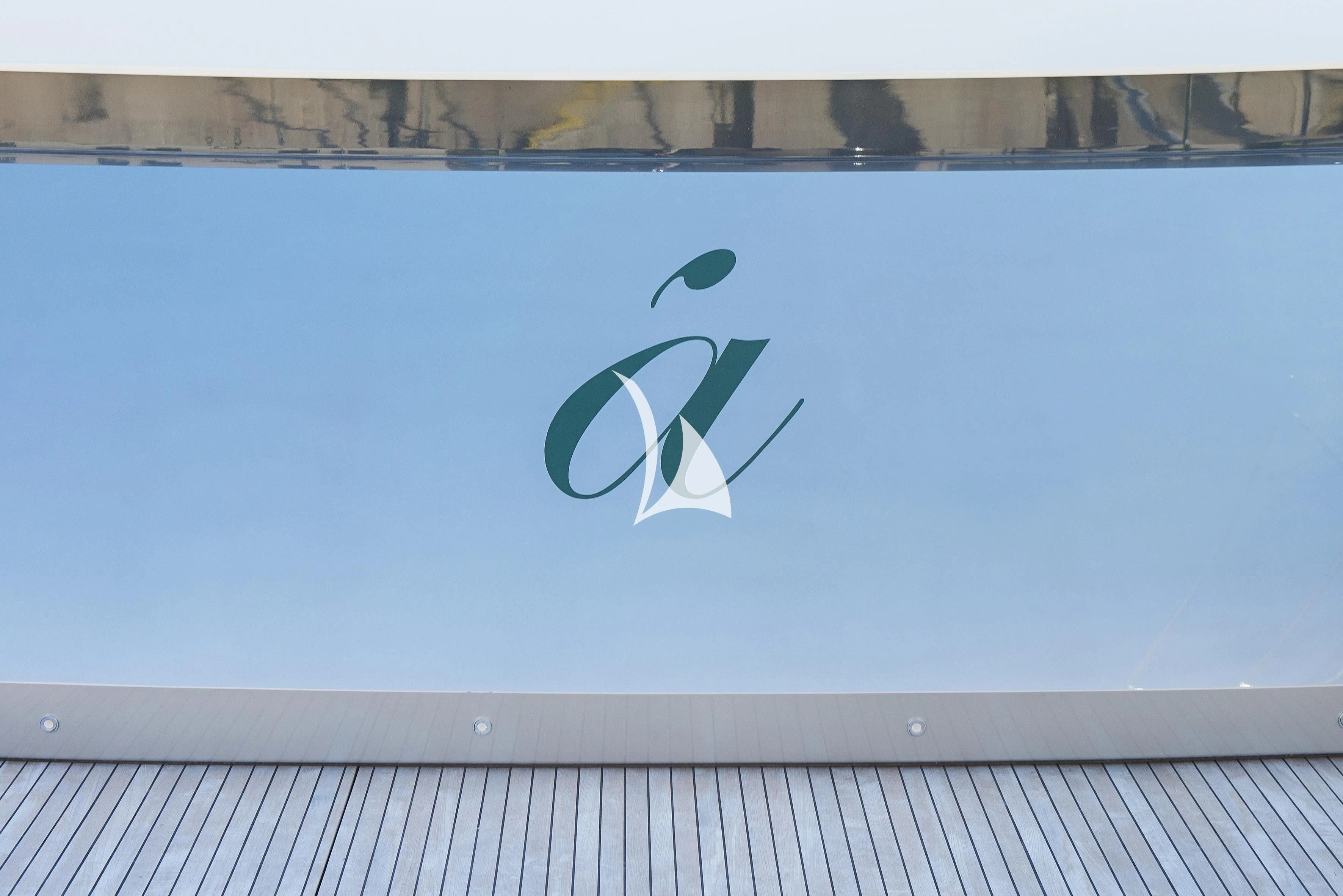 a blue screen with a logo aboard APMONIA Yacht for Sale