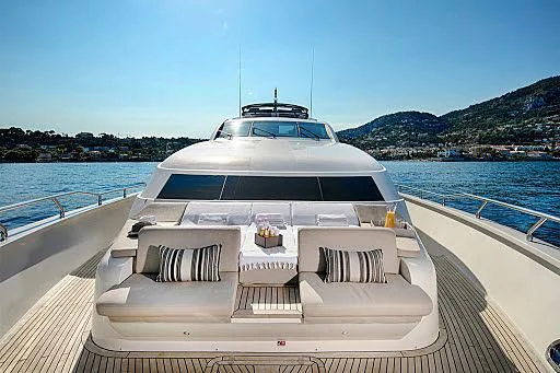 a white yacht on a boat aboard APMONIA Yacht for Sale