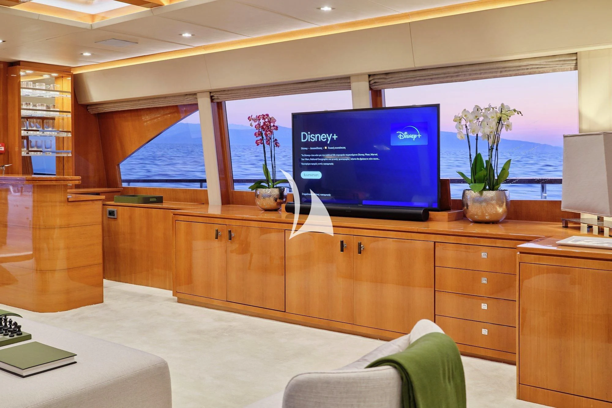 a room with a large tv aboard APMONIA Yacht for Sale