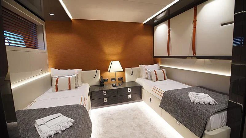a room with two beds aboard MODUS Yacht for Sale