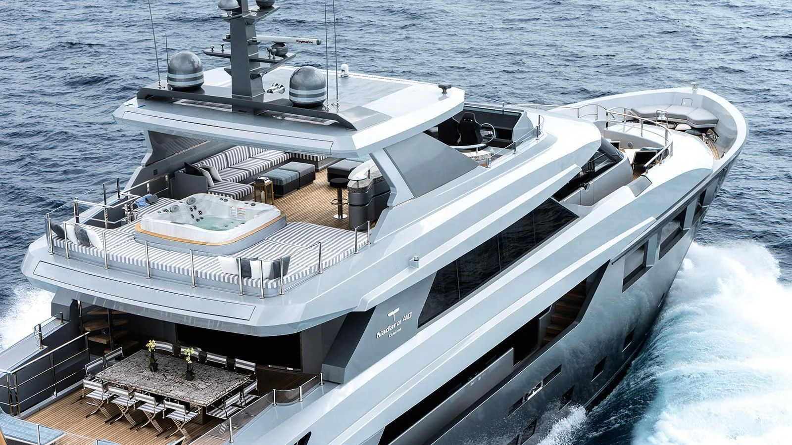 a large ship in the water aboard MODUS Yacht for Sale