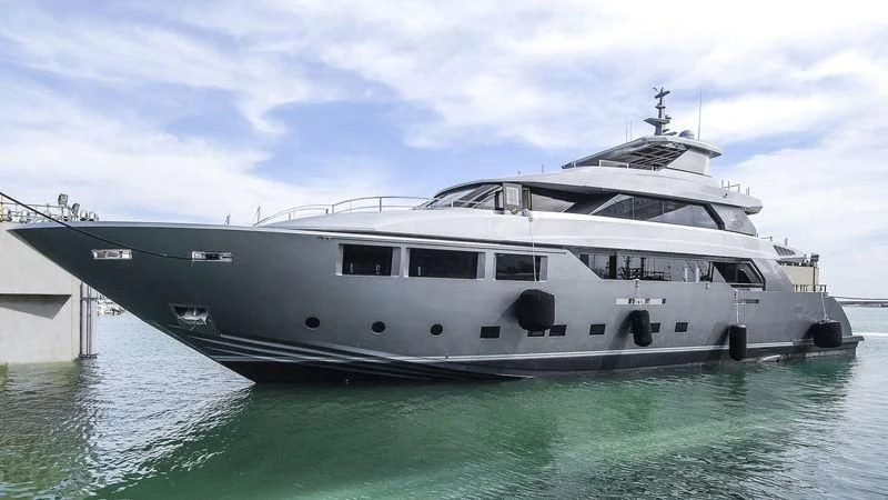 a large white boat in the water aboard MODUS Yacht for Sale