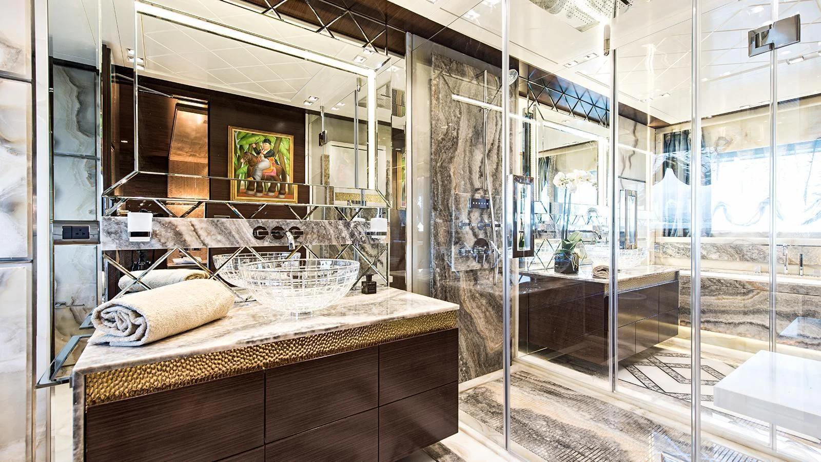 a large bathroom with a large glass shower aboard MODUS Yacht for Sale