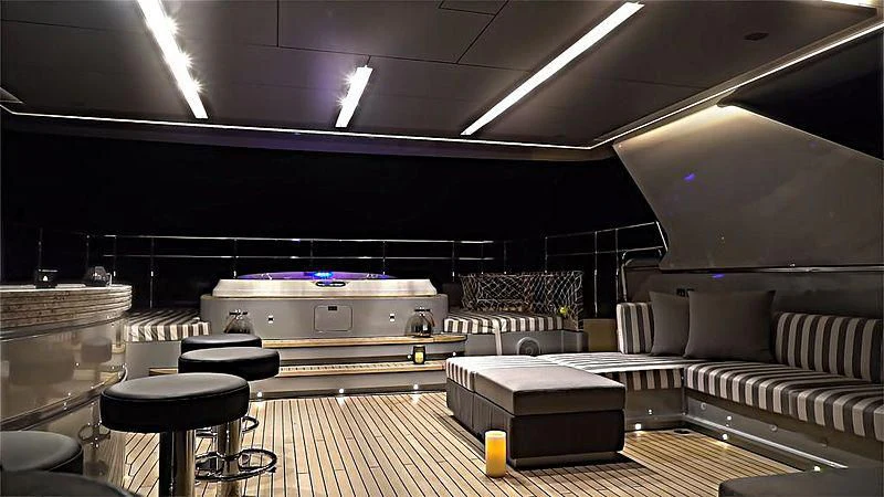 a room with couches and a table aboard MODUS Yacht for Sale