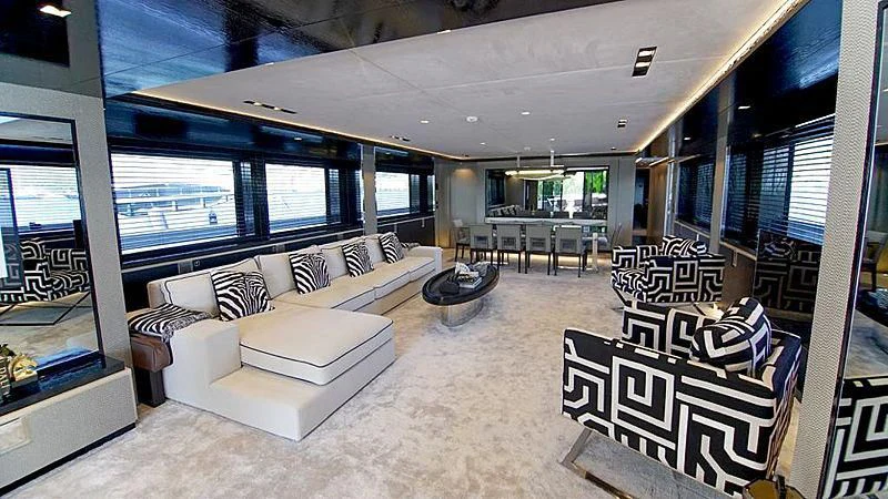 a living room with a large window aboard MODUS Yacht for Sale