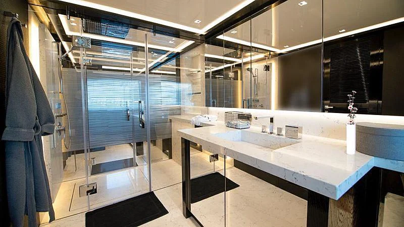 a bathroom with a sink and a mirror aboard MODUS Yacht for Sale