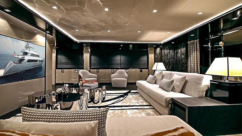 a room with a large mirror and a couch aboard MODUS Yacht for Sale