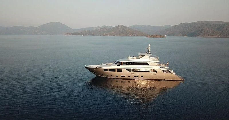 a white yacht on the water aboard MODUS Yacht for Sale