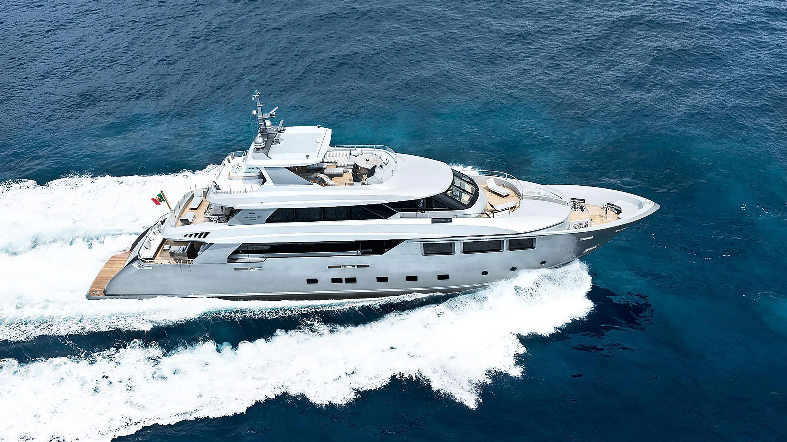 a white yacht in the water aboard MODUS Yacht for Sale