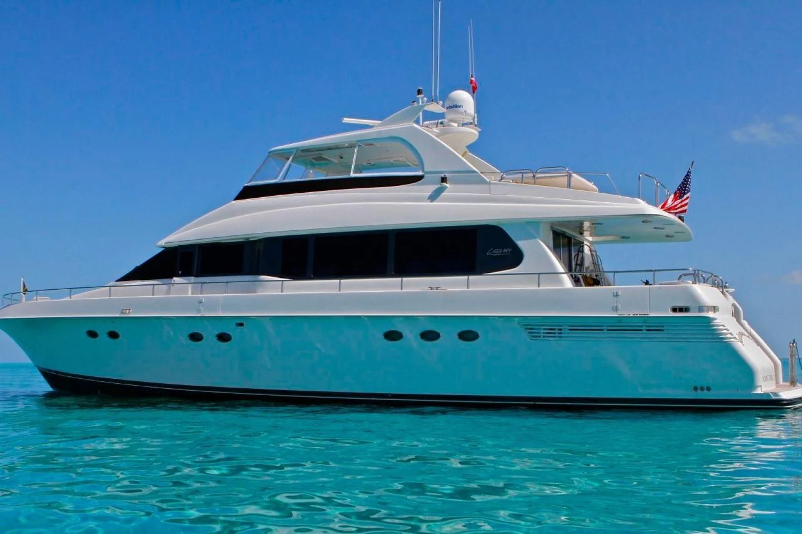 a large white boat in the water aboard COMPANIONSHIP Yacht for Sale