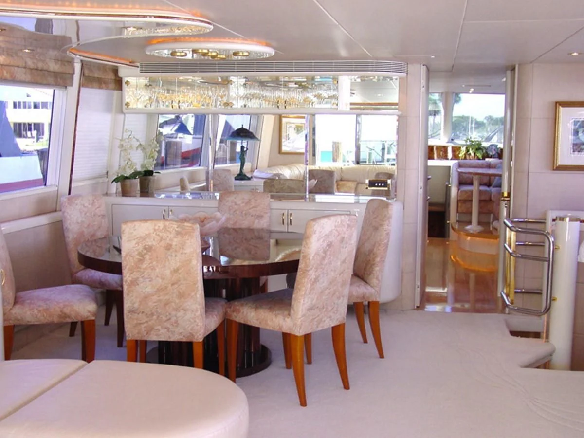 a restaurant with a table and chairs aboard COMPANIONSHIP Yacht for Sale