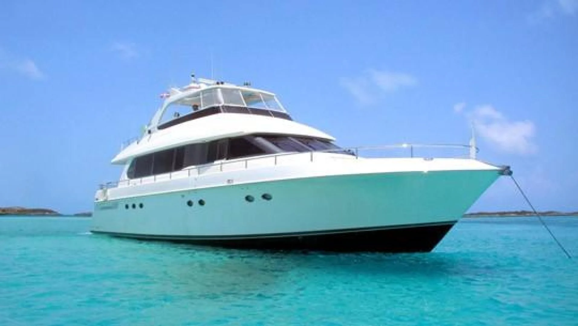 a white yacht in the water aboard COMPANIONSHIP Yacht for Sale