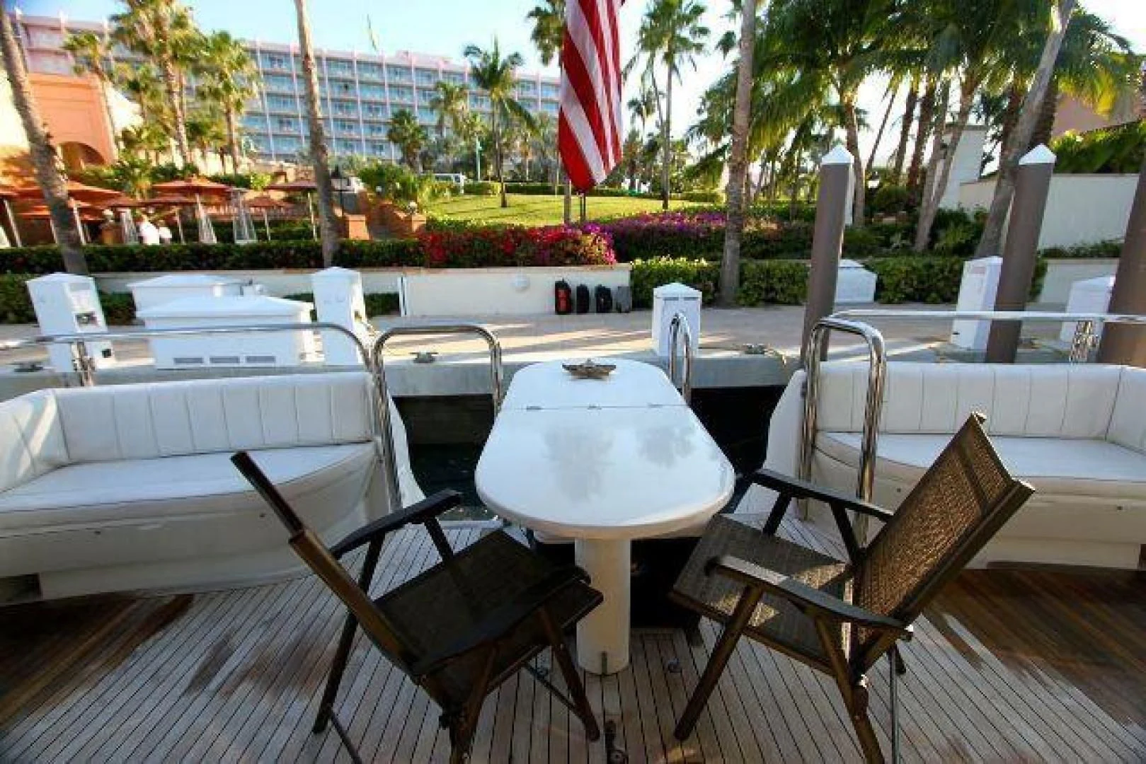 a table and chairs on a deck aboard COMPANIONSHIP Yacht for Sale