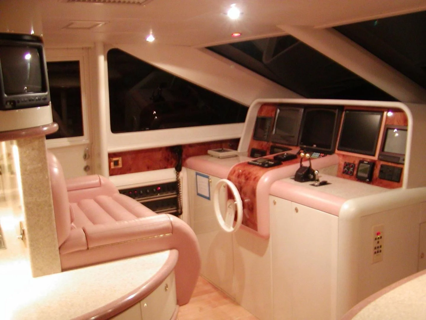 a room with a large white machine and a tv aboard COMPANIONSHIP Yacht for Sale