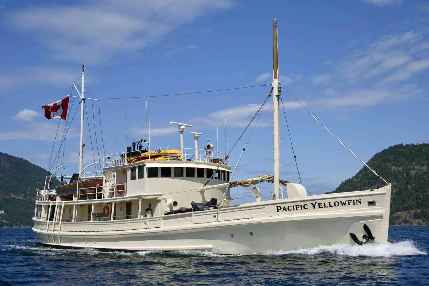 a boat on the water aboard PACIFIC YELLOWFIN Yacht for Sale
