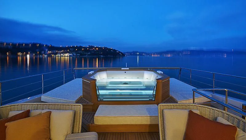a pool with a view of a city and water aboard BELLA ITALIA Yacht for Sale