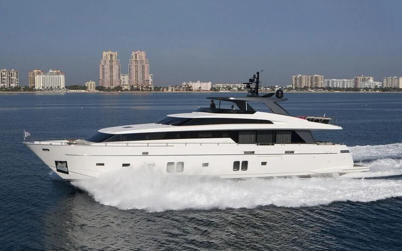 a white yacht on the water aboard BELLA ITALIA Yacht for Sale