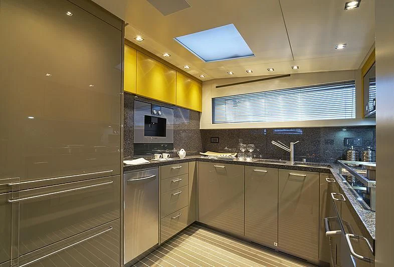 a kitchen with a large refrigerator aboard BELLA ITALIA Yacht for Sale