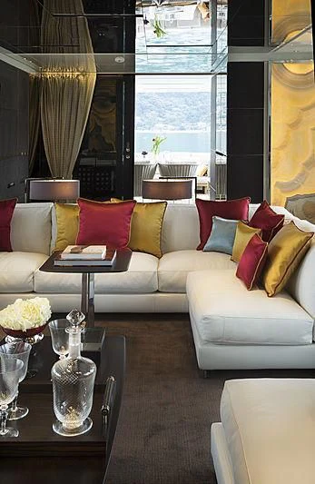 a living room with a couch and a table aboard BELLA ITALIA Yacht for Sale
