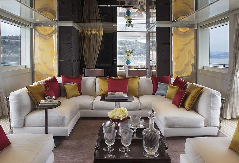a living room with a couch and a table aboard BELLA ITALIA Yacht for Sale