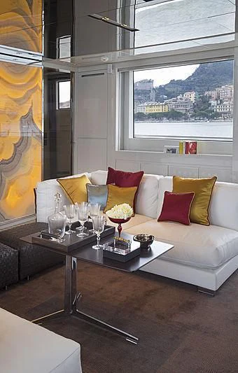 a living room with a white couch and a coffee table aboard BELLA ITALIA Yacht for Sale
