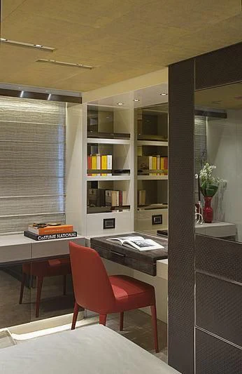 a room with a desk and a chair aboard BELLA ITALIA Yacht for Sale