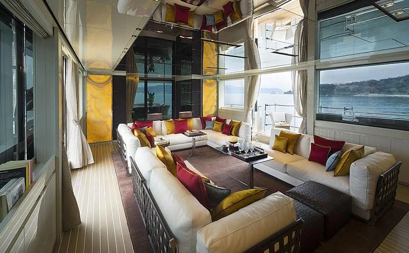 a living room with a large window aboard BELLA ITALIA Yacht for Sale