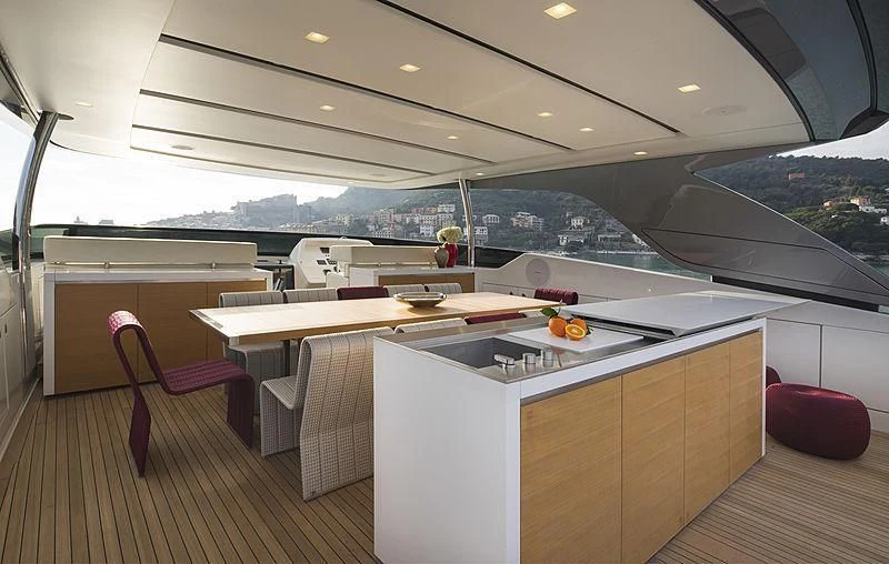 a kitchen with a large glass window aboard BELLA ITALIA Yacht for Sale