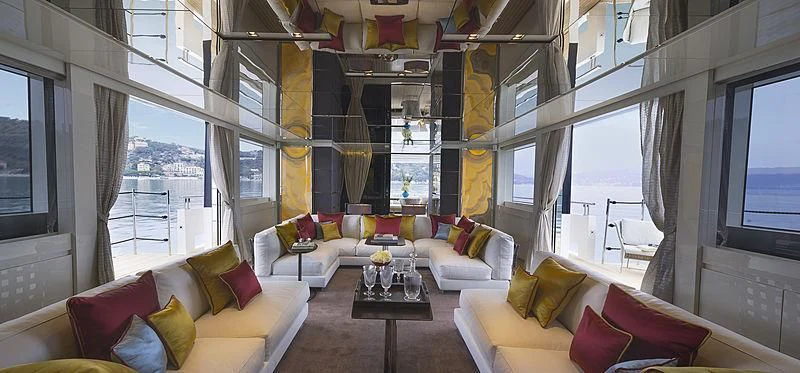 a living room with a couch and a television aboard BELLA ITALIA Yacht for Sale