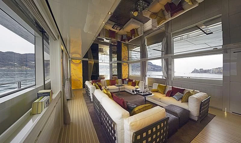 a living room with a large window aboard BELLA ITALIA Yacht for Sale