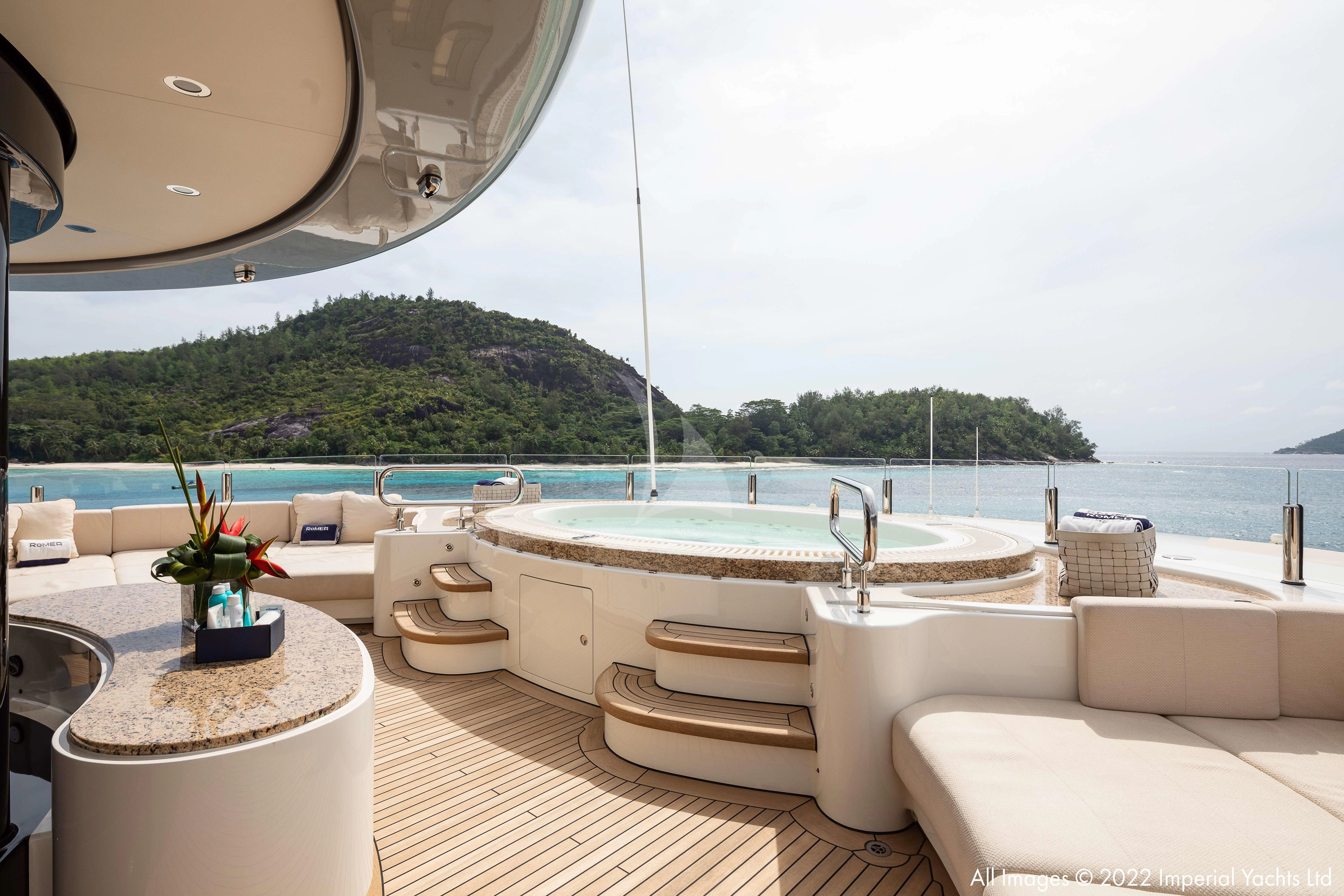 a bathroom with a large tub and a large window overlooking a body of water aboard ROMEA Yacht for Sale